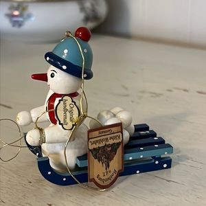 Vintage Kathe Wohlfahrt Christmas ornament w/tag snowman on sled Germany